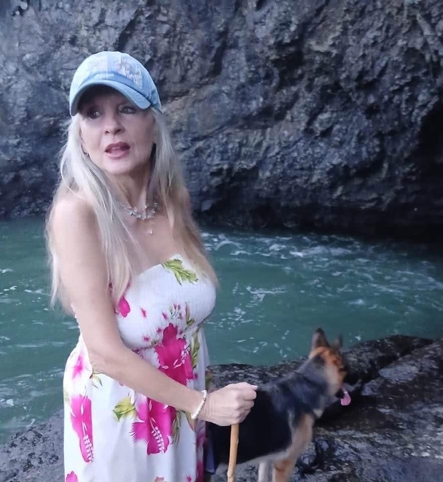 Cheryl Mansfield by the rocky cove